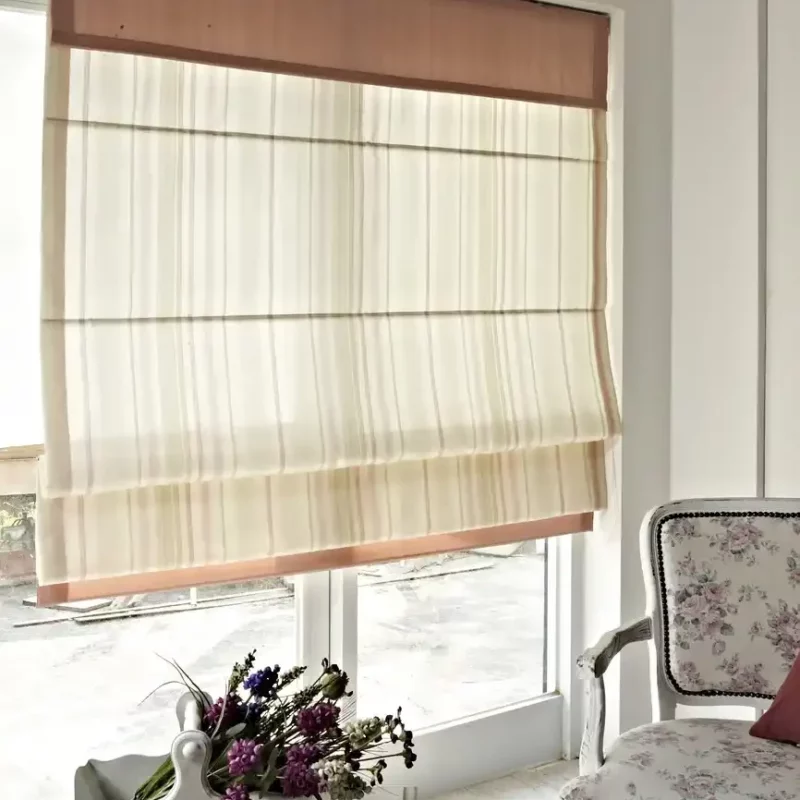 Modern roller shades in a minimalist white design, fully covering the window.